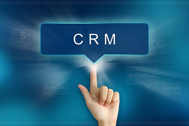istock hand clicking on CRM or Customer relationship management button 497115894