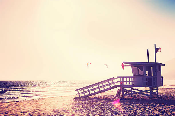 istock Vintage filtered lifeguard tower at sunset. 497116244