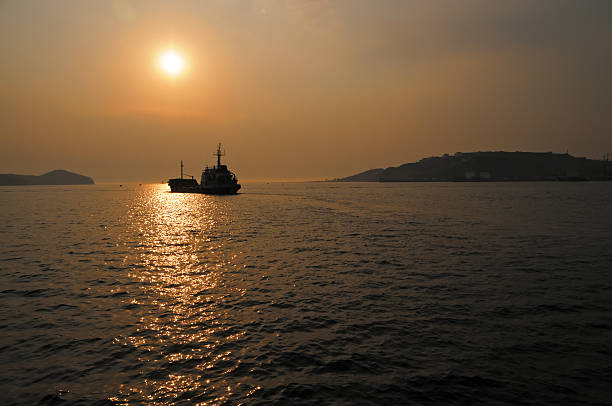 istock Sunset over Golden Horn harbor in Russia 497116531