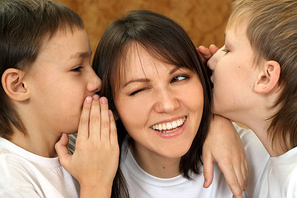 istock Beautiful mum and sons sitting 497120742