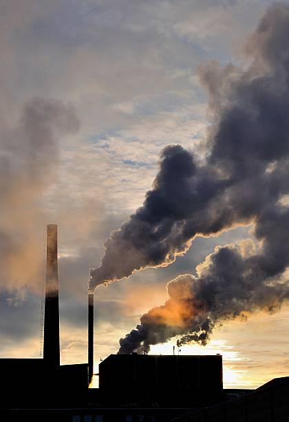 Factory polluting air stock photo
