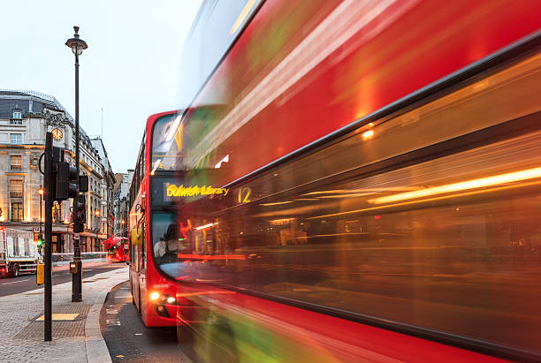 istock London, double-decker buses at Charing Cross junction 497121284
