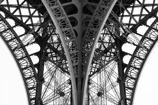 Monochrome detail of the legs of the Eiffel Tower, Paris, France