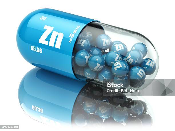 Pills With Zinc Zn Element Dietary Supplements Vitamin Capsules Stock Photo - Download Image Now