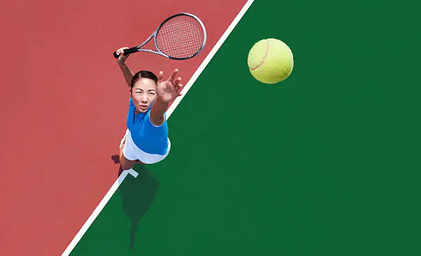 Photo of woman tennis player serving
