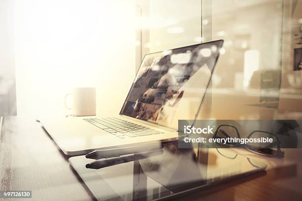 Office Workplace With Laptop And Smart Phone Stock Photo - Download Image Now - 2015, Business, Business Finance and Industry