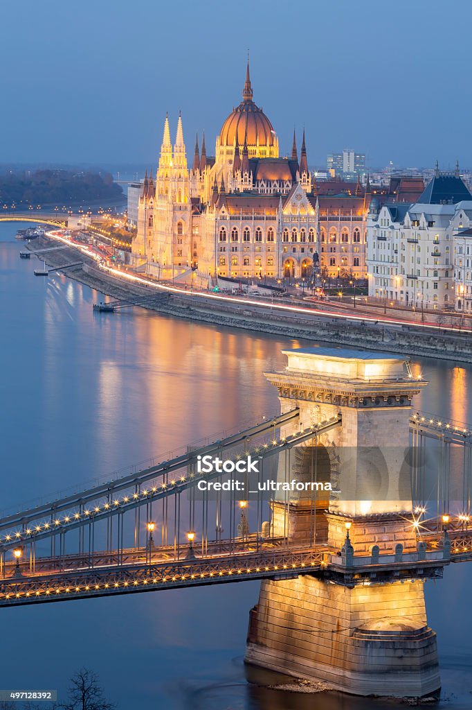 View of Chain Bridge and Parliament in Budapest at dusk View of the Hungarian Parliament Building and the Chain Bridge in Budapest at dusk Budapest Stock Photo