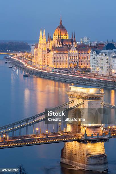 View Of Chain Bridge And Parliament In Budapest At Dusk Stock Photo - Download Image Now