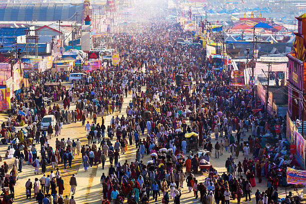 Crowd at Kumbh Mela Festival in Allahabad, India Allahabad, India - February 9, 2013: Crowd at Kumbh Mela festival, the world's largest religious gathering, in Allahabad, Uttar Pradesh, India. prayagraj photos stock pictures, royalty-free photos & images