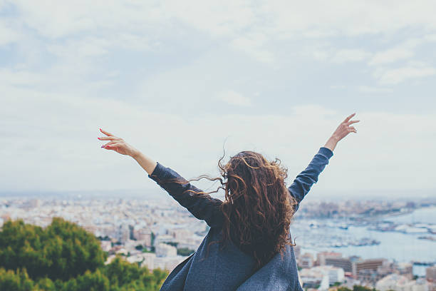 istock Back view of cheerful young woman 497129488