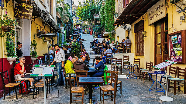 Scenes from Plaka Athens, Greece - November 6, 2015: Scenes from Plaka, also called "Neighbourhood of the Gods", the old district of Athens at the foot of the Acropolis with labyrinthine streets and neoclassical architecture. plaka athens stock pictures, royalty-free photos & images