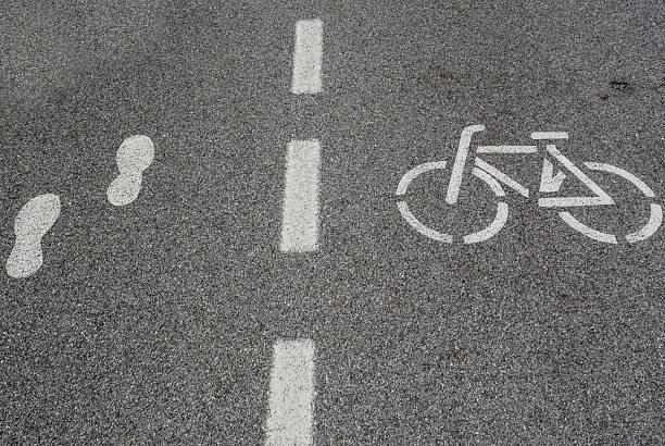 Pedestrian and bike lane signs stock photo