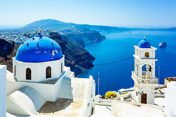 istock Church with blue dome on Santorini 497131647