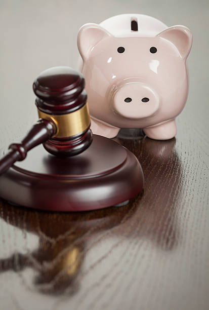 istock Gavel and Piggy Bank on Table 497141931
