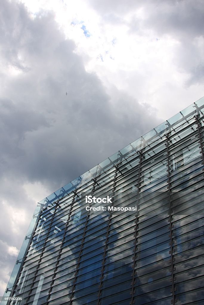 glass facade glass facade against a cloudy sky, Germany Building Exterior Stock Photo