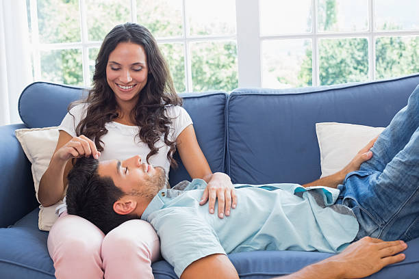 istock Boyfriend lies on girlfriends lap 497142929