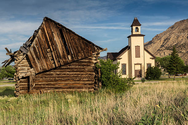 istock Old Emery Meeting House and settler cabin 497143084