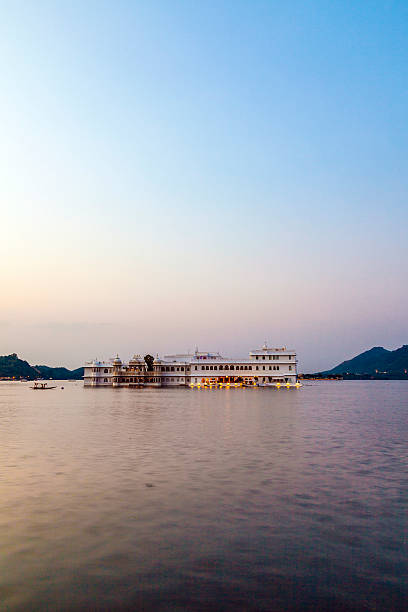 Lake Palace, Udaipur Rajasthan in early morning light The Lake Palace, Udaipur Rajasthan in early morning light lake palace stock pictures, royalty-free photos & images