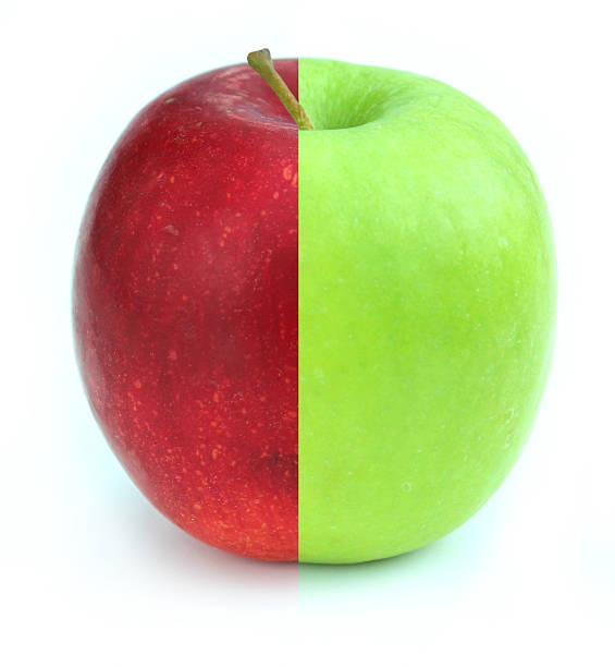 istock Red / green apple, two halves together, GM food / genetically modified 497144411