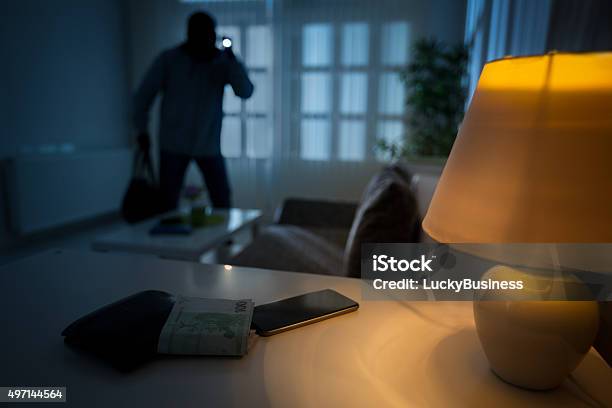 Burglar In A House Inhabited Stock Photo - Download Image Now - Burglary, Thief, Stealing - Crime