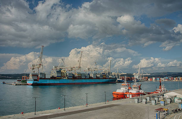 Industrial port of Koper in Slovenia Industrial port of Koper in Slovenia in summer cloudy day. koper slovenia stock pictures, royalty-free photos & images