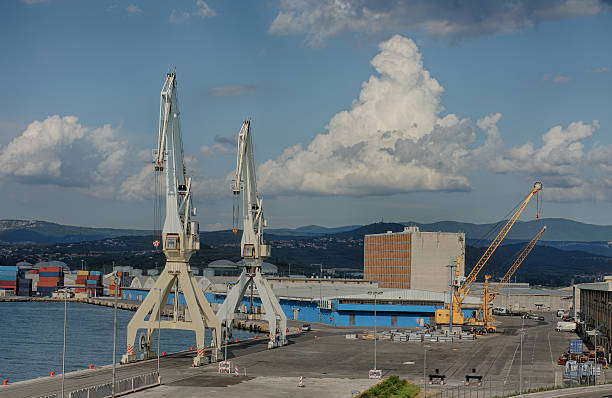 Industrial port of Koper in Slovenia Industrial port of Koper in Slovenia in summer cloudy day. koper slovenia stock pictures, royalty-free photos & images