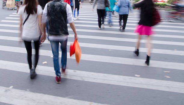 istock People walking on big city street 497146327