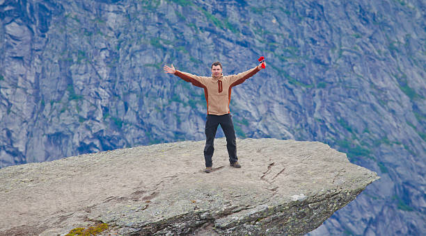 Famous norwegian rock hiking place - trolltunga, trolls tongue, Norway norway, nature, trolltunga, fjord, mountain, landscape, oslo, tongue, troll, hiking, norge, scandinavia, odda, summer, fjords, norwegian, lake, rock, iceland, reykjavik, ringedalsvatnet, hardanger, scandinavian, oslofjord, roldal, sognefjord, beautiful, blue, tourism, nordic, hardangervidda, prekestolen, preikestolen, kjerag, briksdal, Eidfjord, hordalann, Sognefjord, Hardangerfjord, Lysefjord, Geirangerfjord, Nordfjord, Oslofjord, Fjord Norway, Kjeragbolten, Pulpit Rock, Trollstigen, Voringsfossen, Vibrant, norway, nature, trolltunga, fjord, mountain, landscape, oslo, tongue, troll, hiking, norge, scandinavia, odda, summer, fjords, norwegian, lake, rock, iceland, reykjavik, ringedalsvatnet, hardanger, scandinavian, oslofjord, roldal, sognefjord, beautiful, blue, tourism, nordic, hardangervidda, prekestolen, preikestolen, kjerag, briksdal, Eidfjord, hordalann, Sognefjord, Hardangerfjord, Lysefjord, Geirangerfjord, Nordfjord, Oslofjord, Fjord Norway, Kjeragbolten, Pulpit Rock, Trollstigen, Voringsfossen, Vibrant, norway lysefjorden fjord norwegian currency stock pictures, royalty-free photos & images