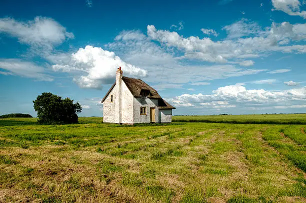 Abandoned thatched cottage on the fens in Norfolk