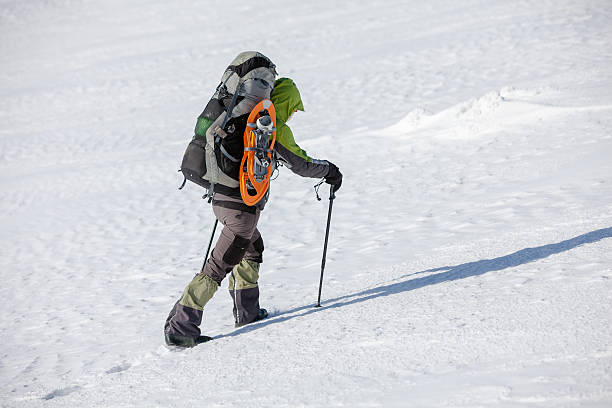 istock Hiker walking in winter Carpathian mountains 497147748