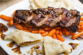 Duck (goose) breast with buckwheat dumplings and carrot