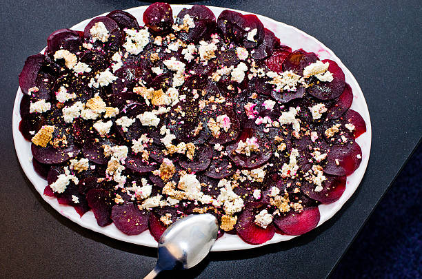 Beetroot carpaccio with cheese stock photo