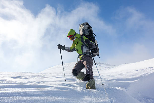 istock Hiker walking in winter Carpathian mountains 497149898