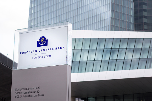 Frankfurt, Germany - November 15, 2015: New building of European Central Bank ECB, EZB headquarters at Eastend Frankfurt, Germany. Entrance and logo in front of the building.