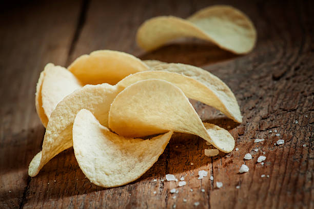 istock Golden potato chips and sea salt 497151342