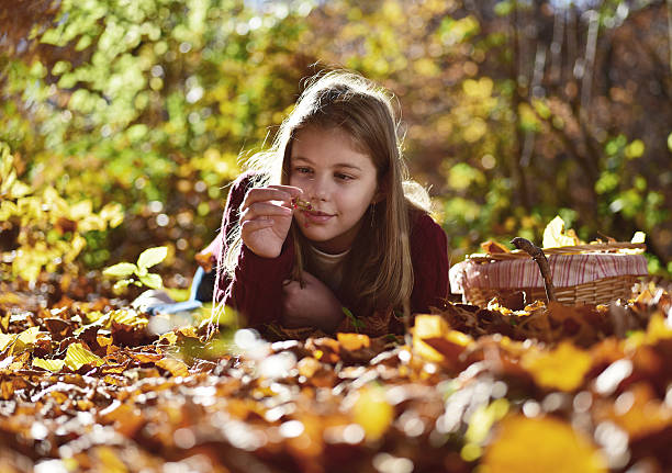 istock Girl eat fruit in the nature 497151476