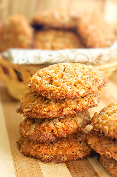 istock Homemade crispy cereal cookies on rustic wooden board. 497152616