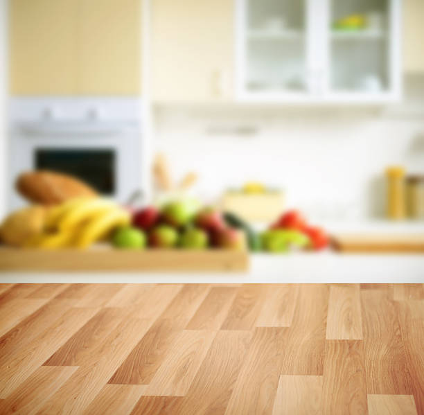 istock wooden background and Defocused kitchen background 497152870