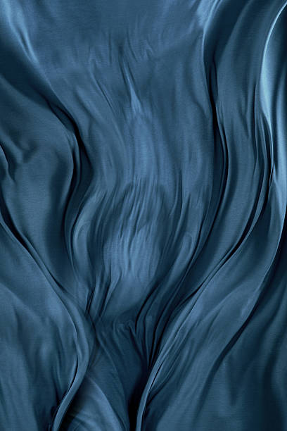 Blue silk A silky blue backgroundhttp://195.154.178.81/DATA/i_collage/pi/shoots/783312.jpg silk curtain stock pictures, royalty-free photos & images