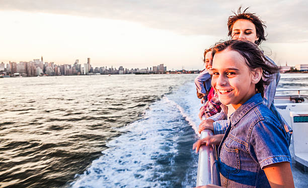 istock Mother and daughter at ferry at Hudson River 497154819