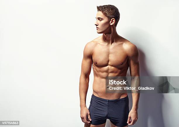 Portrait Of A Young Sexy Muscular Man Stock Photo - Download Image Now - Men, Shirtless, Naked