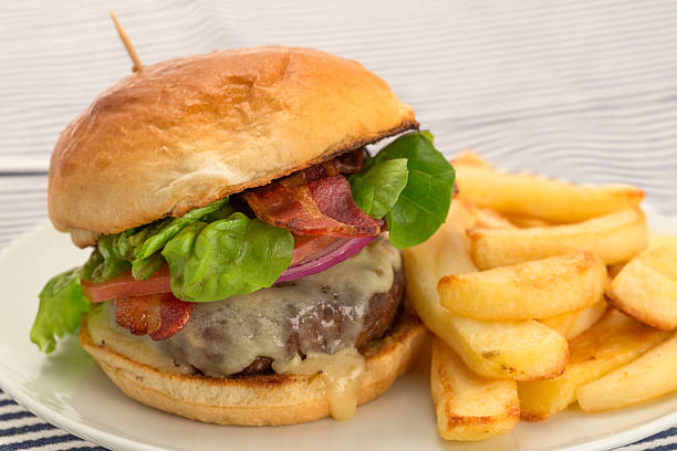 istock Burger and fries with a brioche bun 497155699