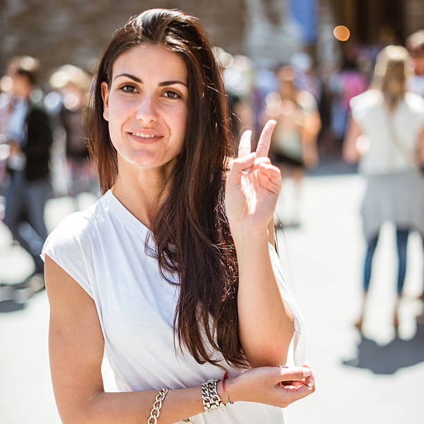 istock smiling woman on the city 497155741