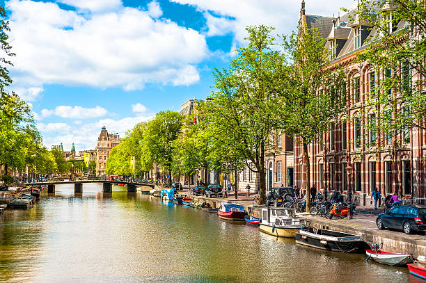 istock Boats on Amsterdam Canal 497155823