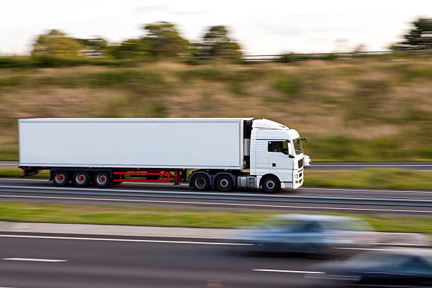 istock industrial lorry on motorway with motion blur 497156067