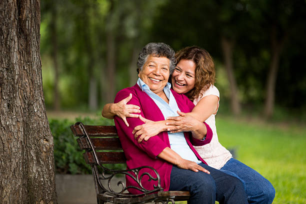 istock Senior mother smiling with daughter 497156195