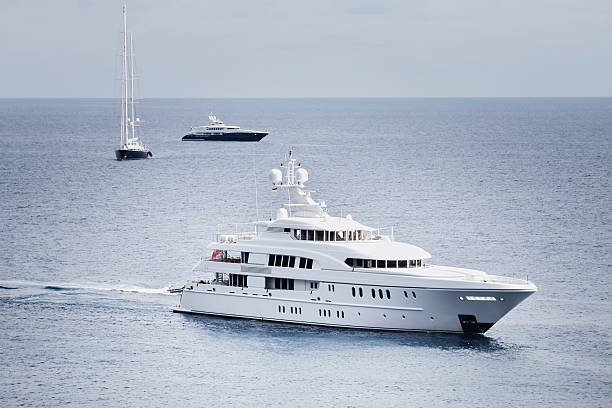 istock Three large yachts at sea off Monaco 497156486