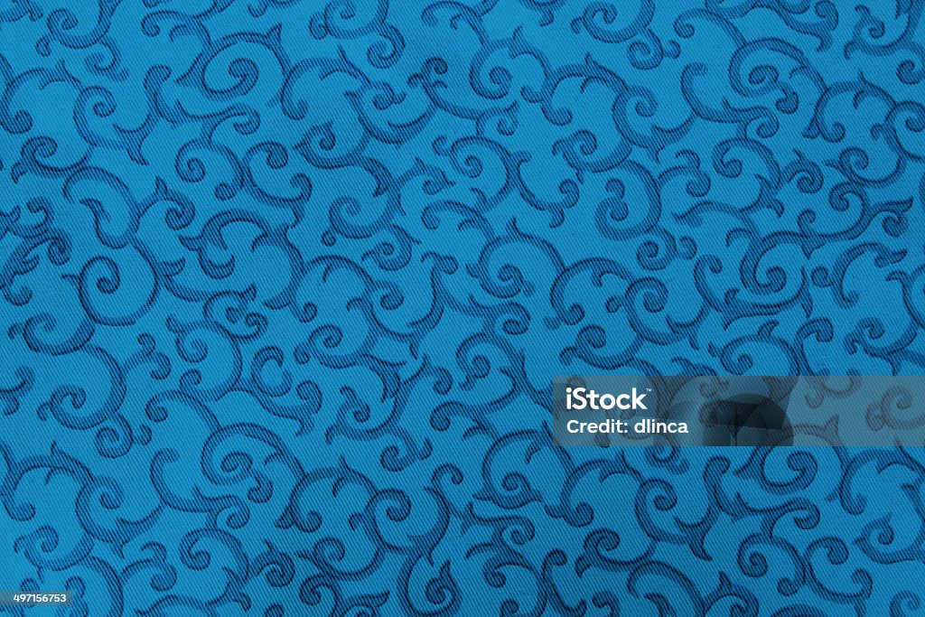 Blue Swirly Fabric Blue on blue swirly fabric Backgrounds Stock Photo