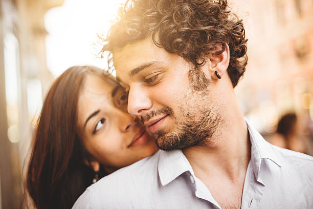 istock couple flirting at sunset 497156865