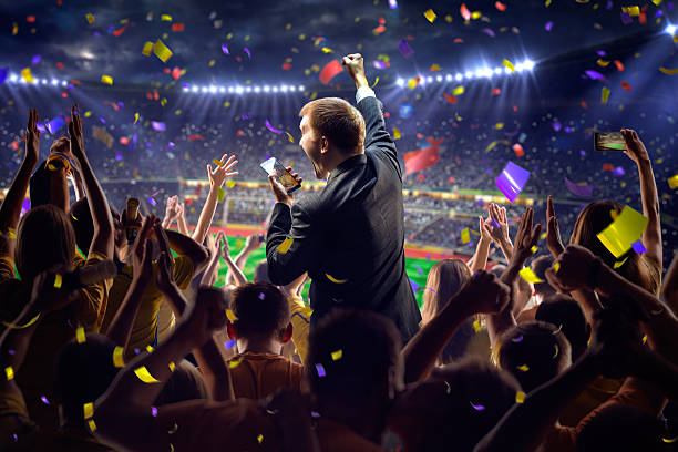 istock Fans on stadium game businessman 497157468